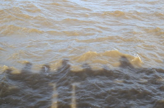 aerial view of a sea with a large wave photo