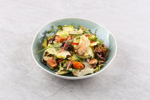 Salad with mussels and nut sauce for the restaurant menu photo