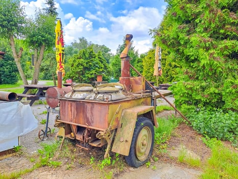 Military field kitchen of World War II is installed in the park for cooking photo
