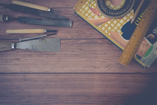 Handyman's tools on wood background. photo