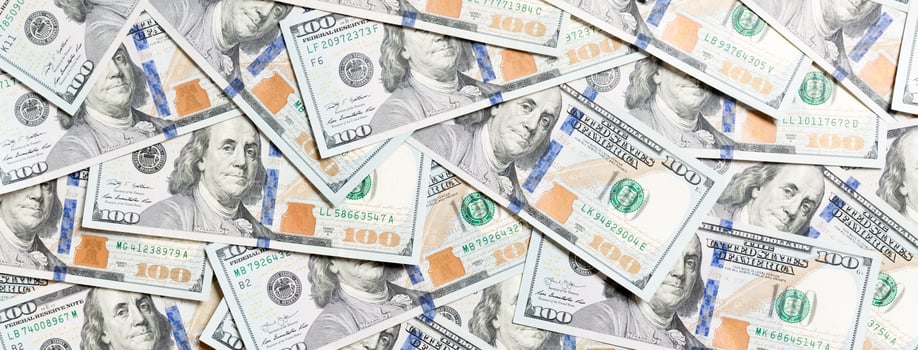 Top view of one hundred dollar banknotes made as a background. USD currency concept. Texture of American dollars photo