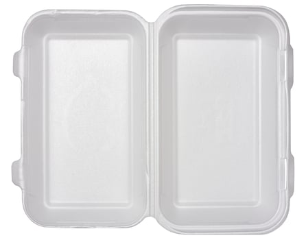 Disposable tableware with lid for hot food on isolated background photo