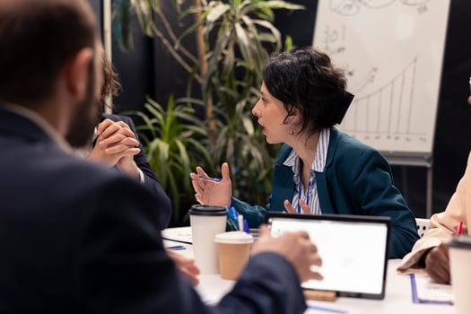 Administrative group discussing agenda for upcoming events coordinated, looking for expansion opportunities in a global collaboration. Multinational business development plans. photo