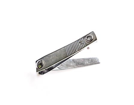 Cut nail clippers metal. Isolated on white background photo