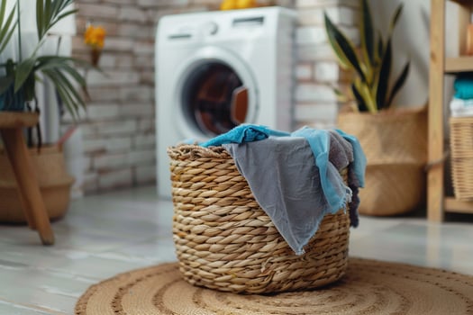 Laundry Basket with Freshly Washed Clothes. photo