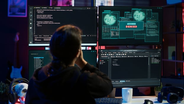 Hacker getting access denied error while doing computer sabotage using ransomware. Cybercriminal failing to penetrate firewalls while trying to steal victim data, camera A photo