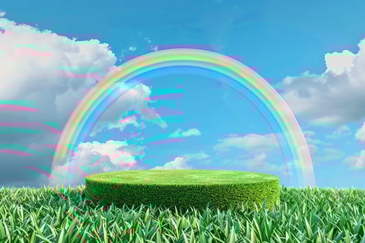 Green grass 3d podium and rainbow on blue sky background. photo