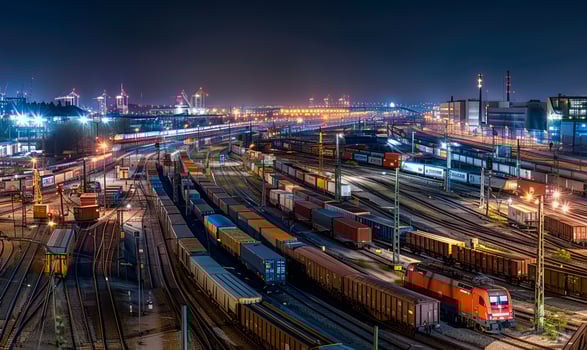 A freight train loaded with containers. Theme of logistics and cargo along railway lines. photo