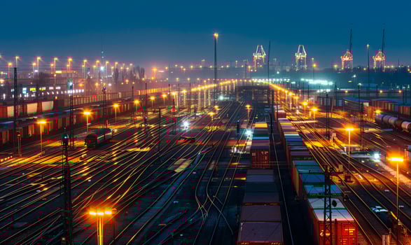 A freight train loaded with containers. Theme of logistics and cargo along railway lines. photo