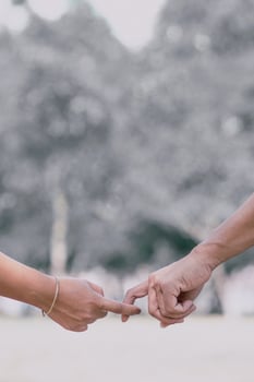 lgbtq couples hold hands to express their love and show couples confidence in their love for each other on their big day and forever Ideas for showing love and care for lgbtq couples by holding hands. photo