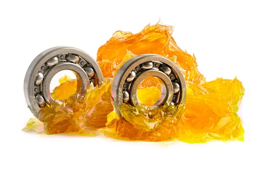 Ball bearing stainless with grease lithium machinery lubrication for automotive and industrial isolated on white background. photo