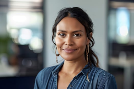 Confident Woman Smiling In Office photo