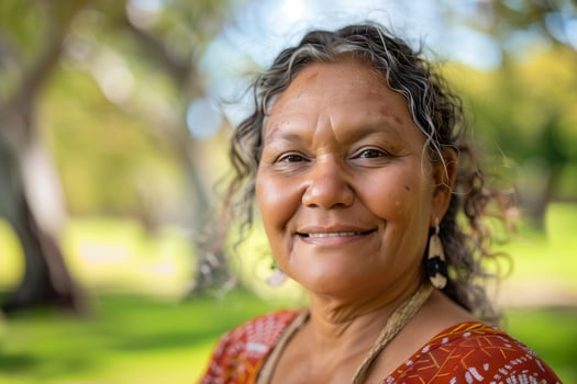 Aboriginal Australian Woman Smiling Outdoors photo