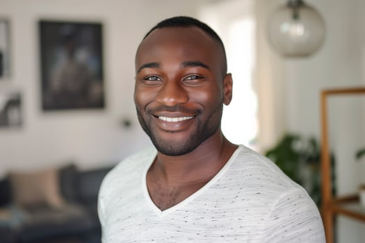 Happy Man Smiling In Casual Interior photo