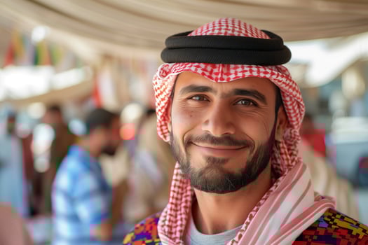 Smiling Arab Man In Traditional Attire photo