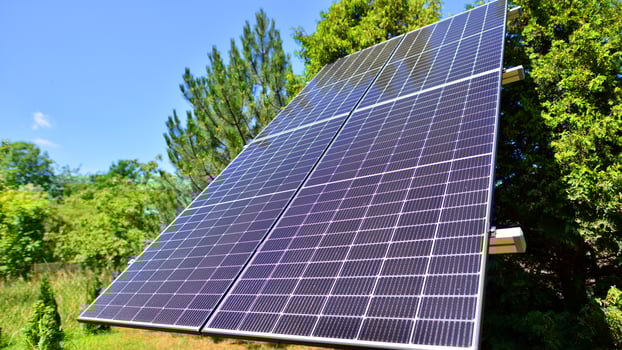 Solar power station generating clean energy. Solar panels in the nature. photo