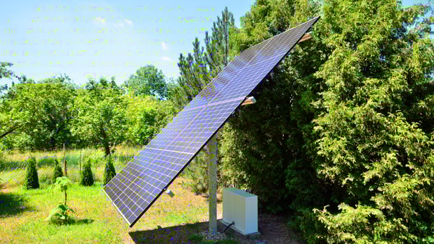 Solar power station generating clean energy. Solar panels in the nature. photo
