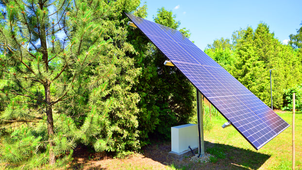 Solar power station generating clean energy. Solar panels in the nature. photo