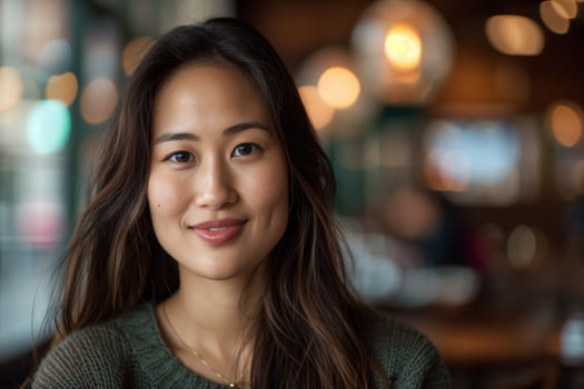 Beautiful Asian Woman Smiling Indoors photo