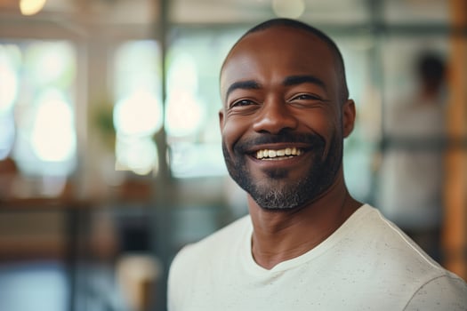 Smiling Man In Bright Modern Space photo