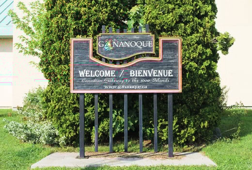 Gananoque, Canada - August 13, 2017 - Tourist Information signpost Welcome. Canadian Gateway to the 1000 Islands photo