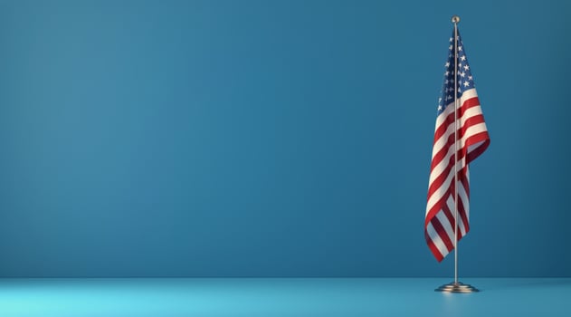 American Flag Waving on a Blue Background photo