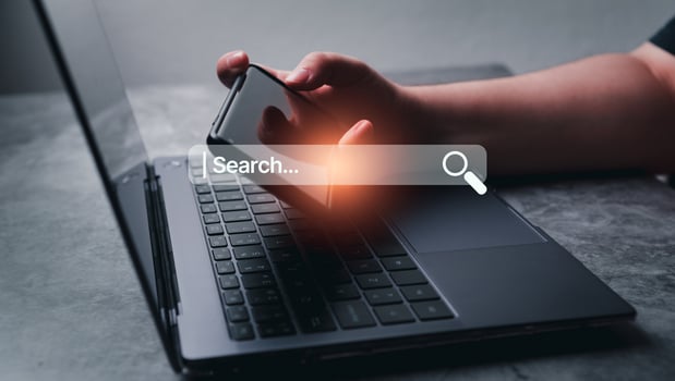 Woman use smartphone to find something. Searching information data on internet networking concept. Search browser VR interface. photo