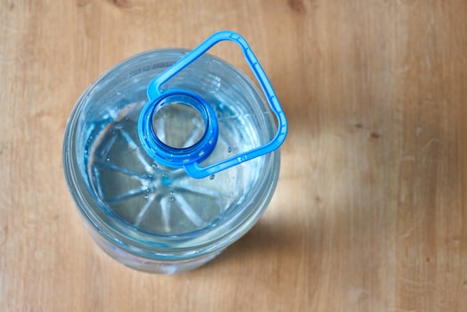 5 liter blue plastic water bottle photo