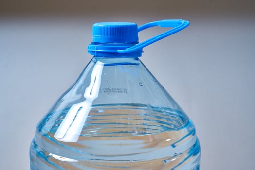 5 liter blue plastic water bottle photo
