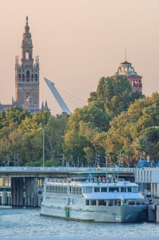 Cruise Ship Docked on Guadalquivir River in Seville, Spain photo
