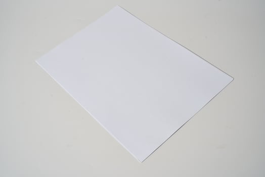 a 4 paper on a white background photo
