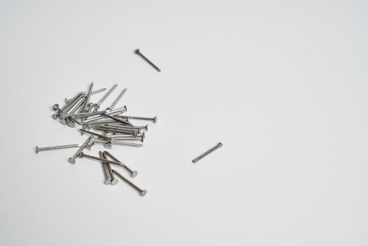 Wood nails on a white background photo