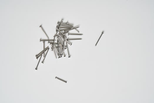 Wood nails on a white background photo