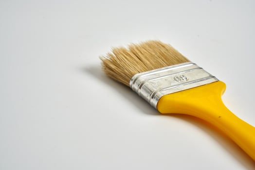 small paint brush on a white background photo