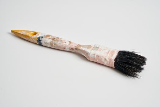 small paint brush on a white background photo