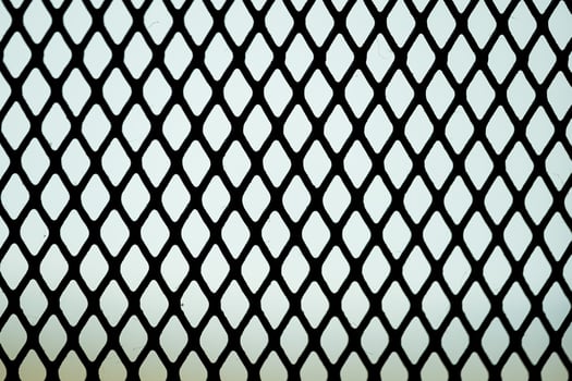 Diamond-shaped metal mesh pattern photo