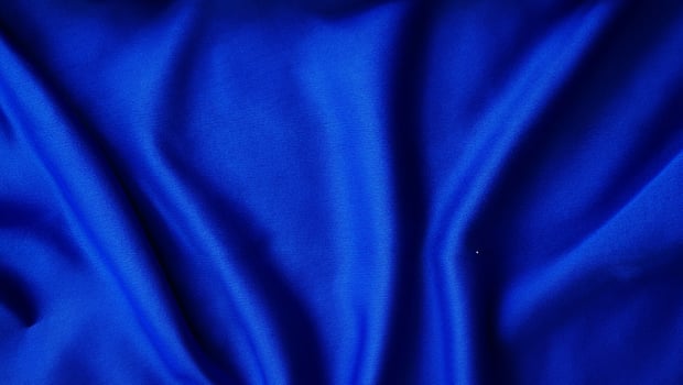 Crisp Blue Silk Fabric Texture Ideal for Sportswear Background photo
