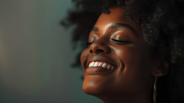 Cheerful lady with curly hair and earrings gazing upwards photo