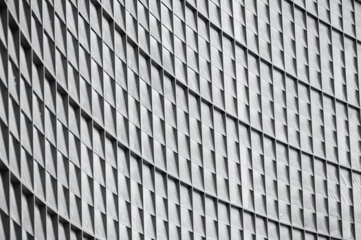 curve glass windows square pattern modern contemporary architecture building design photo