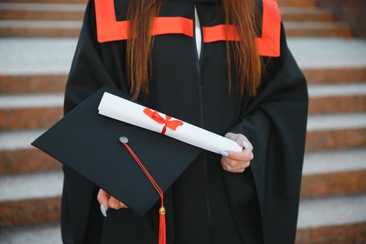 Portrait happy woman on her graduation day University. Education and people. photo