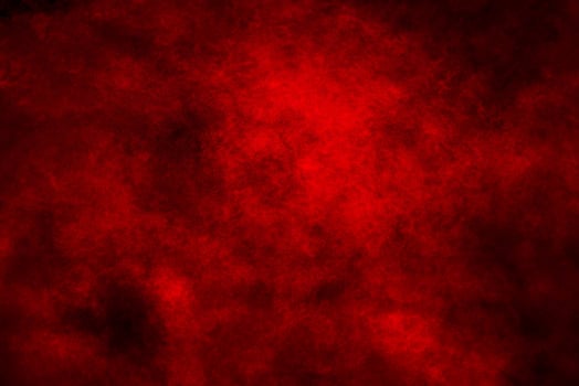 Crimson Powder Burst on Dark Background photo