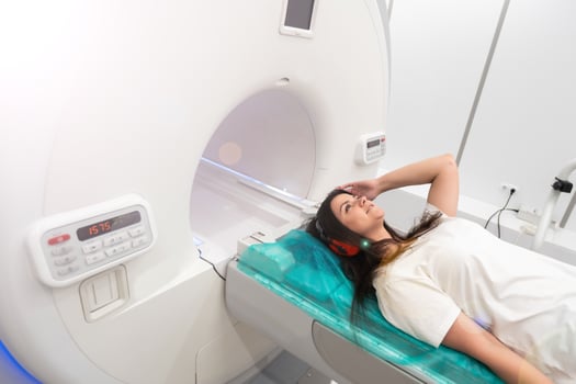 Medical CT or MRI Scan with a patient in the modern hospital laboratory. Interior of radiography department. Technologically advanced equipment in white room. Magnetic resonance diagnostics machine photo