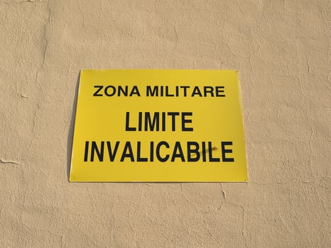 italian military zone do not trespass sign photo