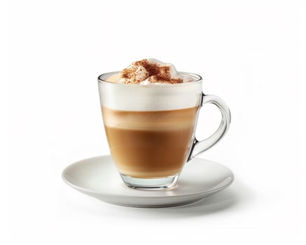 a cappuccino with whipped cream on a saucer photo