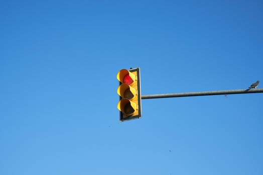 traffic light on blue sky photo