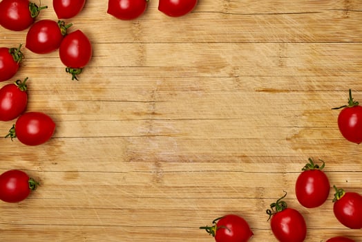 cherry tomatoes on a cutting board photo