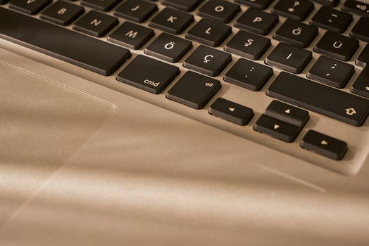metallic grey laptop on a table photo