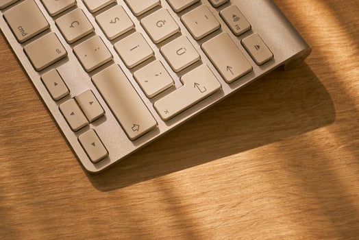 metallic grey laptop on a table photo
