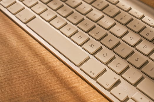metallic grey laptop on a table photo