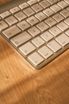 metallic grey laptop on a table photo